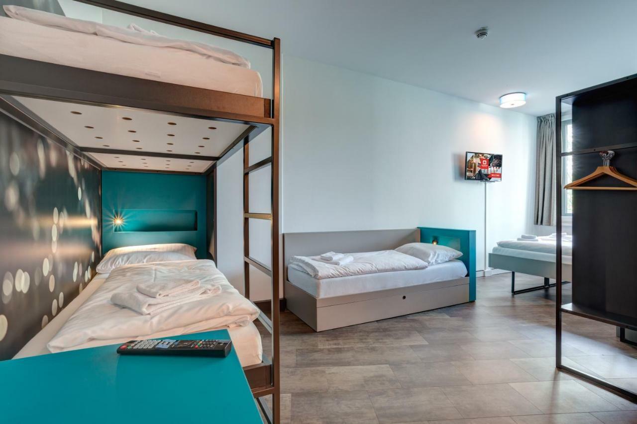 Meininger Hotel Muenchen Olympiapark Bagian luar foto